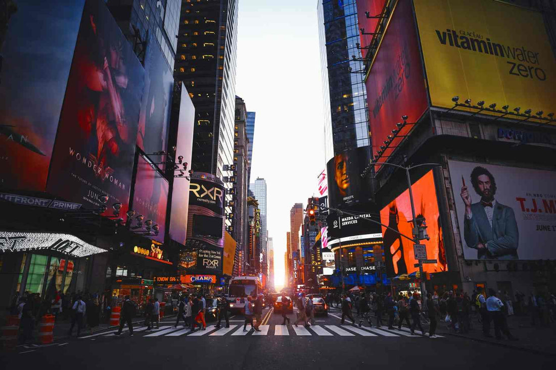 People cross a crosswalk in Times Square New York City