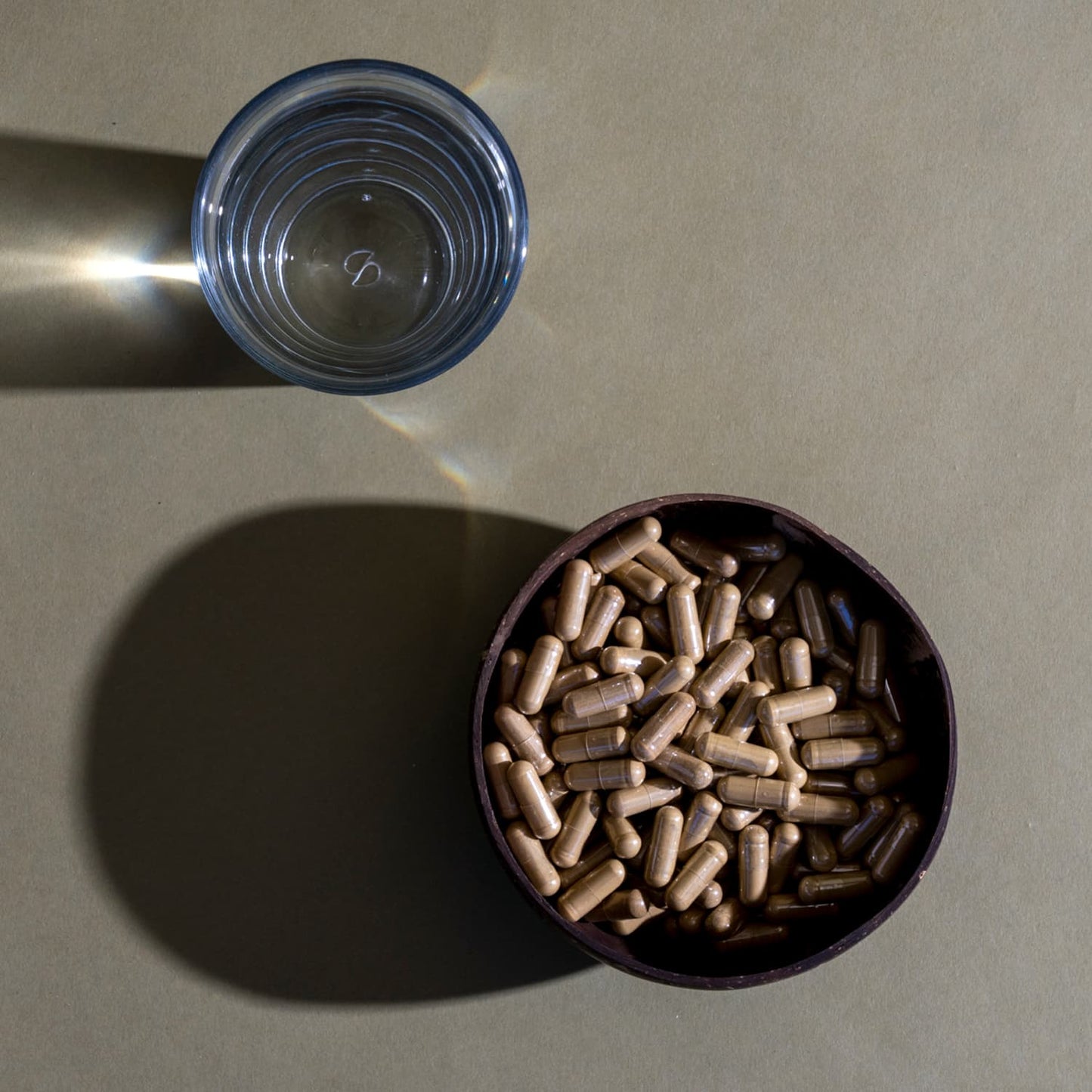 Royal Kratom Bali Kratom Capsules in a bowl